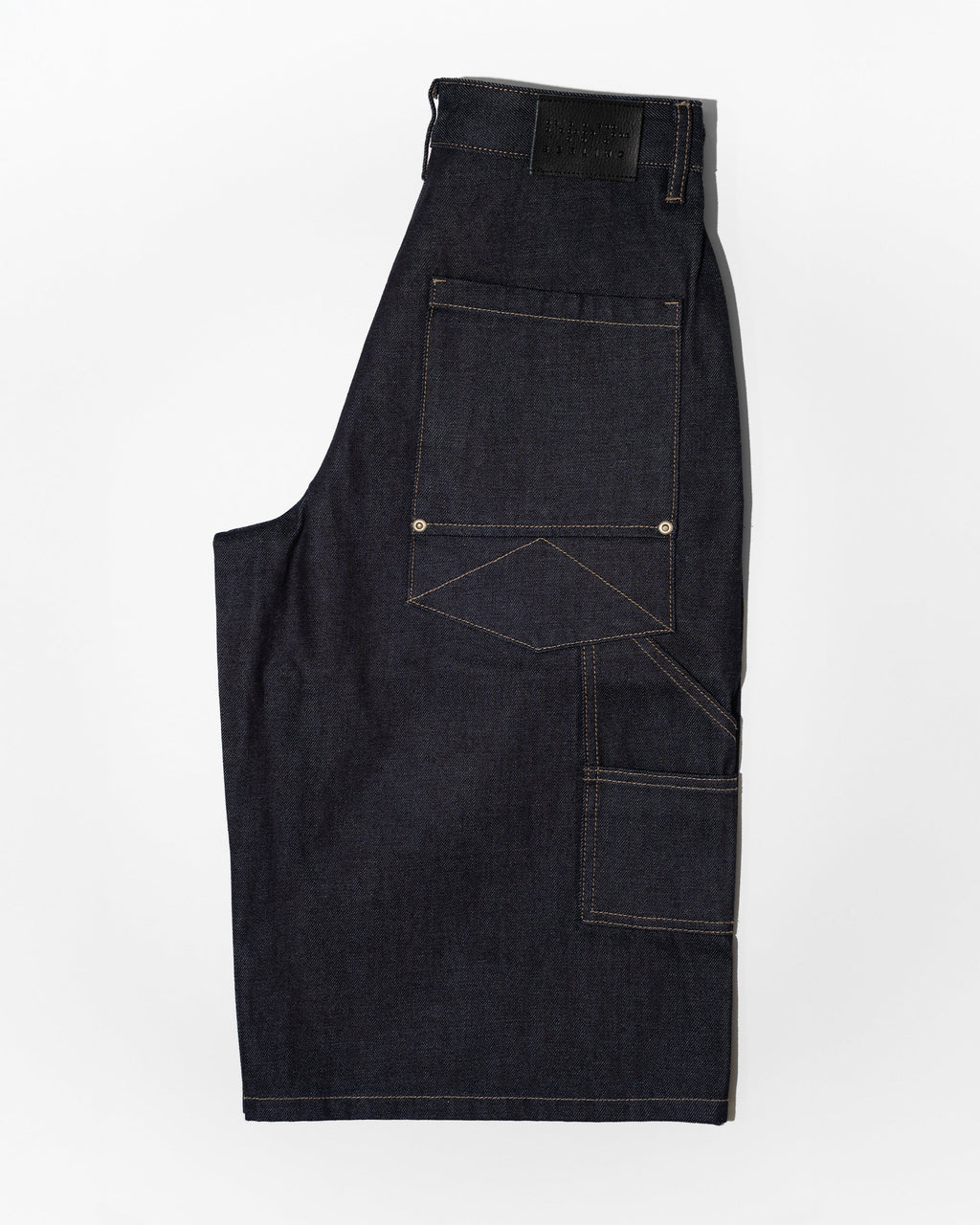 PLEATED RAW INDIGO JORTS