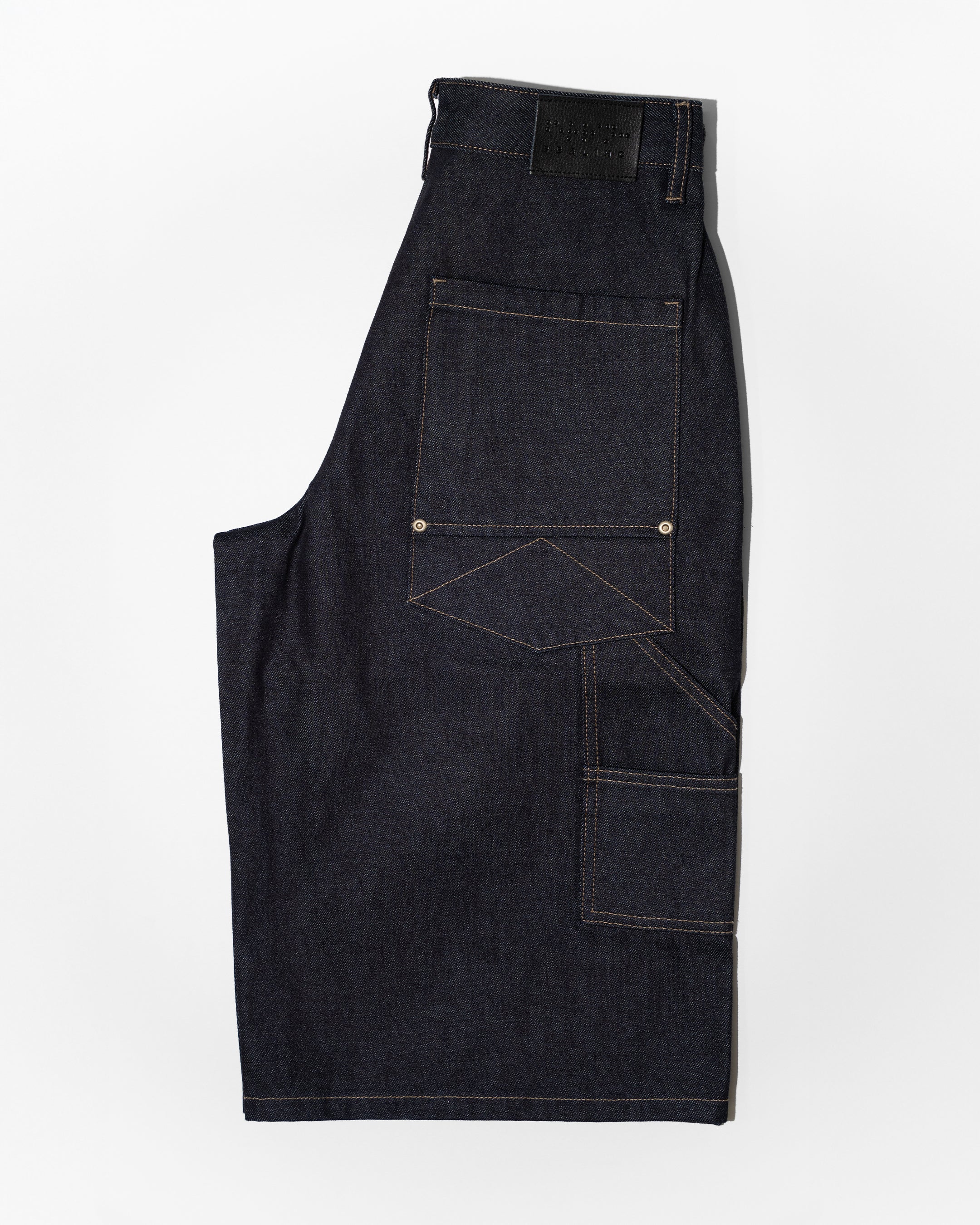 PLEATED RAW INDIGO JORTS
