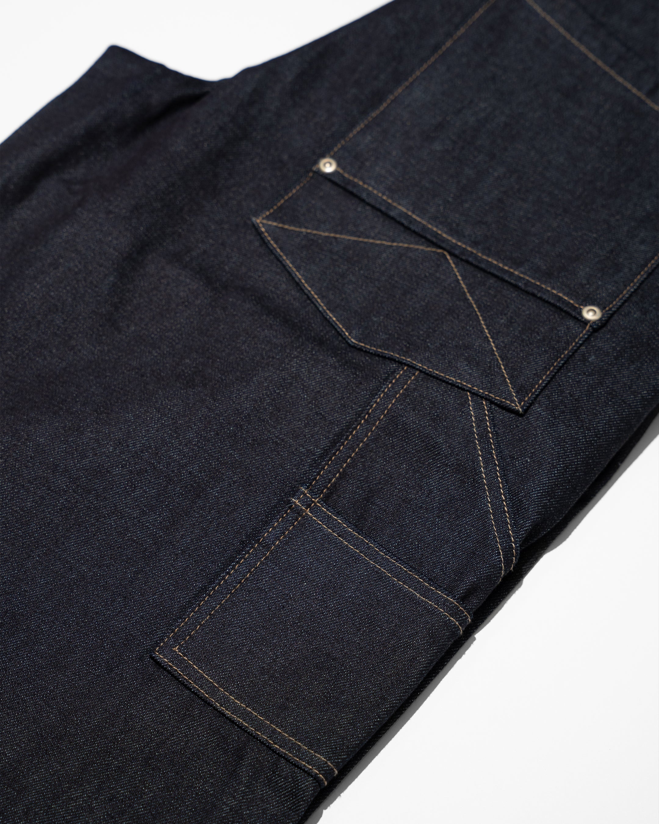 PLEATED RAW INDIGO JORTS