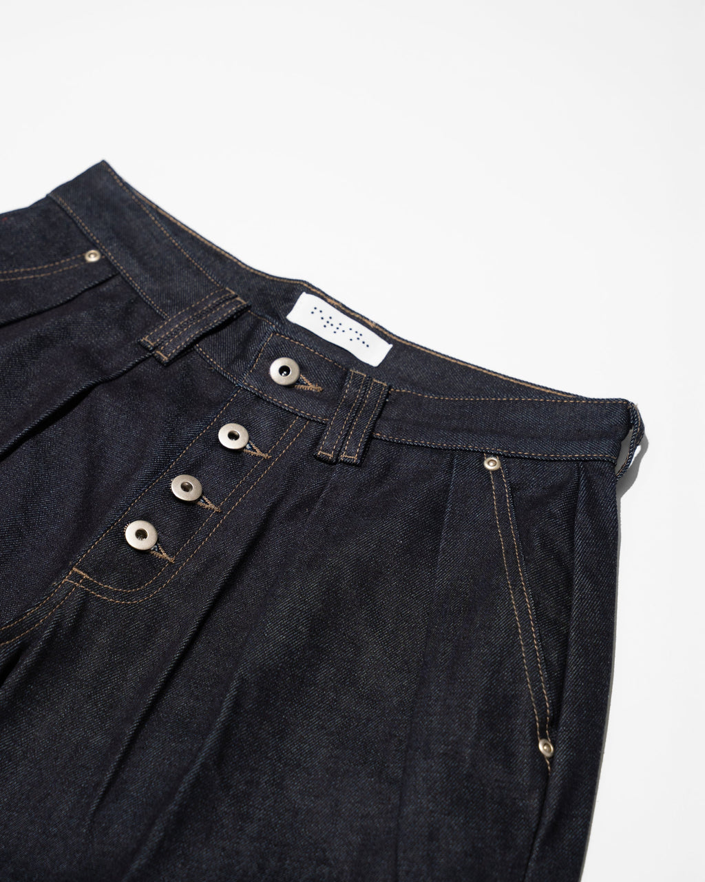 PLEATED RAW INDIGO JORTS