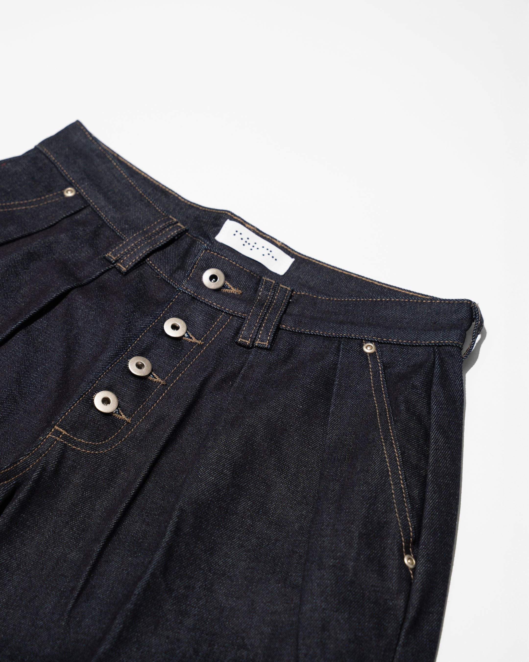 PLEATED RAW INDIGO JORTS