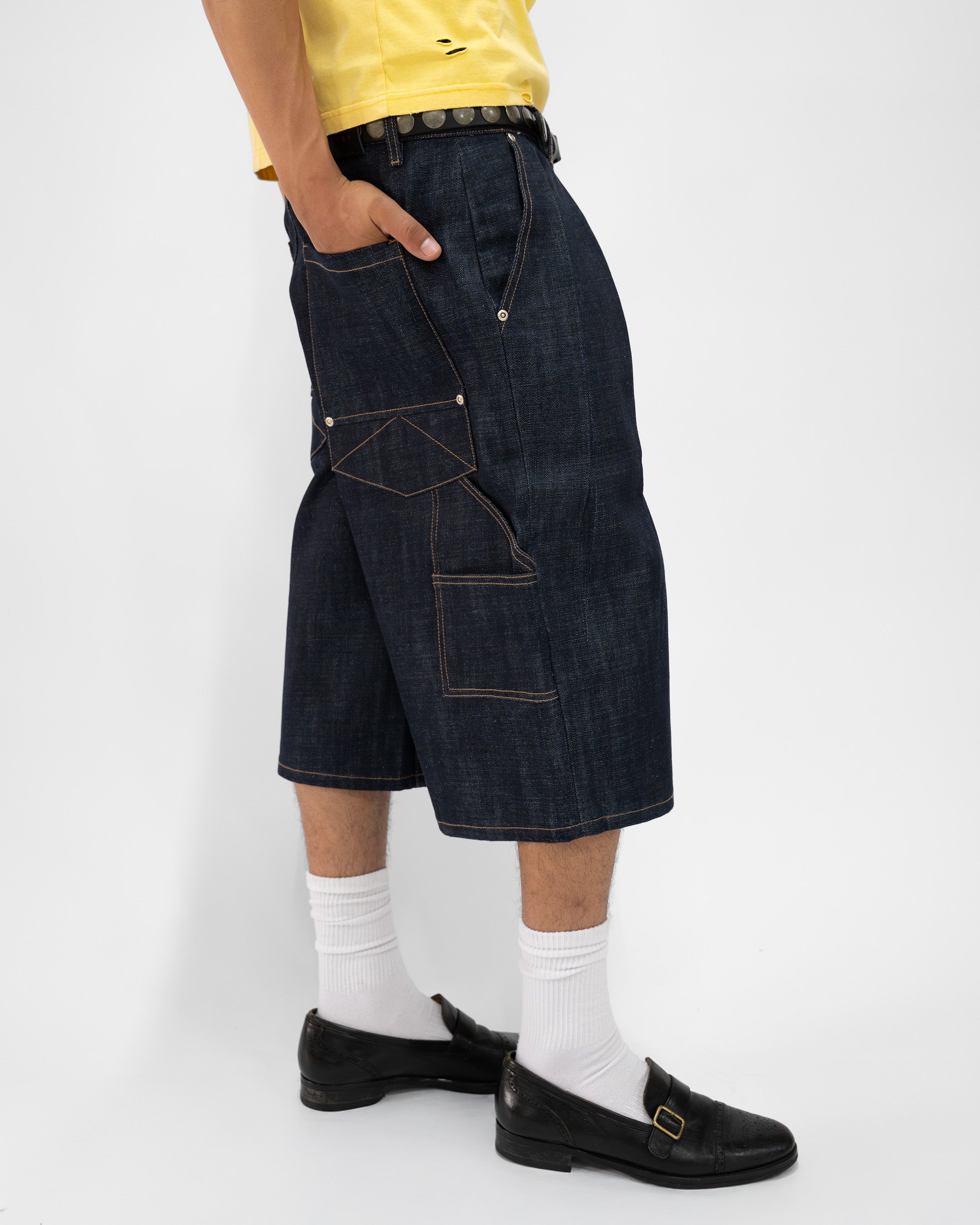 PLEATED RAW INDIGO JORTS