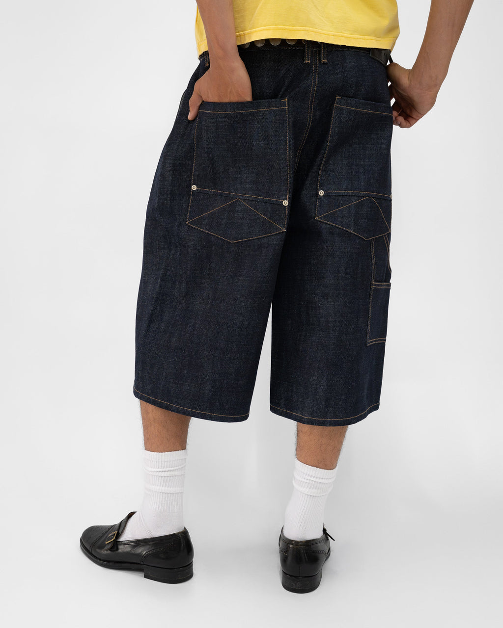 PLEATED RAW INDIGO JORTS